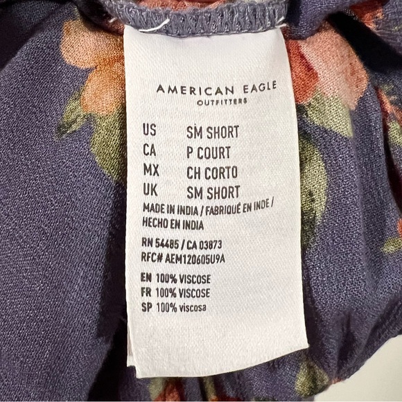 American Eagle Purple Floral Cropped Ruffle Wide
Leg Flowy Jumpsuit - Picture 7 of 7